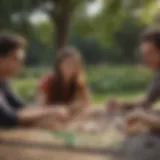 Group of friends engaged in a board game outdoors