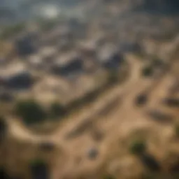 Aerial view of a Free Fire battleground featuring diverse terrains and structures